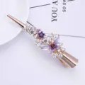 Élégante pince à cheveux fleur strass en alliage, cristaux violets brillants et design élégant. - Violet