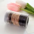 Seamless rubber hair bands for women, elastic hair ties in clear storage container. - Earth Tone