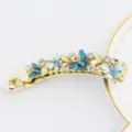 Élégante pince à cheveux banane en métal de 10 cm avec fleurs en émail bleu et strass. - HB00747 Bleu