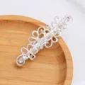 Silver alloy flower hair clip with rhinestones and pearls, elegant barrette for women. - Silver