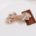 Gold tone rhinestone bow hair clip, sparkling crystal spring hairpin for women styling. - Bow Rhinestone Hair Clip (F014303)