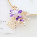 Elegant gold-tone hair comb featuring purple enamel flowers, pearls, and sparkling rhinestones. - FS20863 Purple