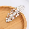 Elegant silver alloy flower hair clip with faux pearls and sparkling rhinestones for women. - Silver