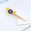 Sweet enamel floral hair clip with faux pearls and rhinestones, elegant gold hair accessory. - Yellow and Black