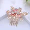Elegant gold tone floral hair comb with pink enamel leaves, faux pearls and clear rhinestones. - FS20864 Pink