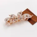Rhinestone butterfly hairpin with sparkling crystals and rose gold spring clip design. - Bow Rhinestone Hair Clip (F014312)