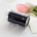 Black elastic hair ties in clear jar, seamless hair bands for women daily styling. - Black