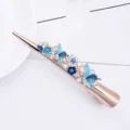 Blue enamel flower rhinestone metal hair claw clip, large retro horn clip variant style. - Blue
