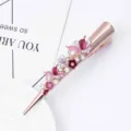 Rose gold alloy flower hair clip with sparkling rhinestones and pink enamel, elegant design. - Pink
