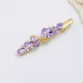 Purple crystal bow hair clip, elegant gold-tone metal duckbill clip for women styling. - Purple (H010039)