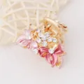Pince à cheveux strass avec nœuds émaillés roses, accessoire élégant pour femmes. - Rose