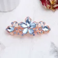 Molla per capelli in lega oro rosa con strass blu, elegante fermaglio floreale traforato 8cm. - Stile Fiore (F014739) / Blu zaffiro