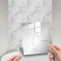 Waterproof marble pattern tile sticker for wall and floor decor, self-adhesive, glossy finish. - DLS002 / 10 Pieces