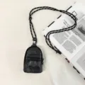 Mini mochila negra con cordón, monedero y estuche para auriculares de tendencia para uso diario. - Negro