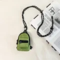 Mini mochila verde para monedas y auriculares con cordón, estuche urbano moderno. - Verde