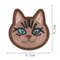 Cute cartoon cat head embroidery patch close up, brown fabric iron on applique for clothes repair. - Style 3