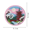 Detailed embroidery patch showing traditional Japanese pagoda, cherry blossoms and bridge detail. - Landmark Style (DW9256-5)