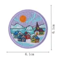 Detailed view of the round winter northern lights embroidered patch, showing fine stitching. - Landmark Style (DW9256-7)