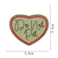 Heart-shaped embroidered patch detail showing the black lettering and red border clearly. - Heart Do Not Pet Embroidery Patch (DW9809-25)