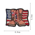 Detailed view of the American flag and combat boots embroidered patch, showing fine stitching. - Military Boots