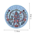 Close-up detail of the retro Scorpio zodiac embroidered patch, showing fine stitching and vibrant colors. - Scorpio