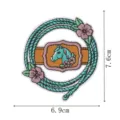 Embroidered horse patch detail showing western cowboy style flower and rope design element. - Horse Head Rope