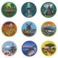 Set of 9 world landscape embroidered iron-on patches, travel souvenir badges for jackets and backpacks - Set of 9