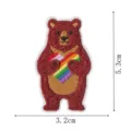 Embroidered bear patch with rainbow heart, cute cartoon clothing iron-on applique detail. - Bear Hugging Heart