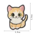 Gros plan du patch brodé de chat mignon avec des lignes de dimensions précises pour bricolage. - DW9286-4