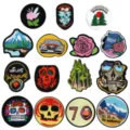 Set of embroidered patches featuring cute skulls, flowers, and landscapes for clothing DIY. - DW9082 Set of 15