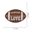 Football embroidery patch detail view, brown fabric badge with white text, apparel accessory. - DW9807-32