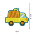 Detail view of a colorful embroidered car patch, featuring fine stitching and vivid truck design. - DW9173-3
