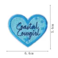 Blue heart embroidered patch detail, featuring coastal cowgirl lettering and cute star design. - Heart Surf Girl