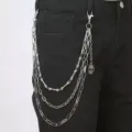 Punk style multi-layer metal pants chain with skull and bone charms for hip-hop streetwear. - Style 7