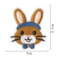 Cute cartoon bunny embroidery patch with blue bow and headband, perfect for DIY clothing decor. - Rabbit Style 4 (DW9232-4)