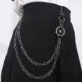 Close-up detail of punk style double layer metal pants chain featuring ship helm charm. - Gun Black Pants Chain