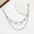 Detailansicht der mehrschichtigen Hip-Hop-Punk-Metall-Hosenkette mit Kreuz-Anhängern. - Silber