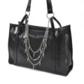 Sac cabas noir en cuir avec chaîne argentée tendance et pendentif clouté pour le style quotidien. - Chaîne de Sac à Rivets à Trois Couches