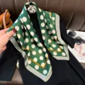 Green silk square scarf with white polka dots and orange border, stylish women's accessory. - RY-15