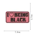 Embroidered patch featuring pink background and black typography with heart symbol detail. - Slogan Style (DW9810-48)