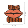 Close-up view of custom embroidery patch showing detailed black and orange lip design. - Black Queen Lip Style (DW9810-46)
