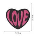 Black heart embroidery patch with pink LOVE text, iron-on decorative clothing badge main view. - Heart LOVE Style (DW9810-37)