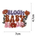 Detail shot of the embroidered patch featuring floral design and text quote clearly. - DW9121-16
