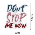 Embroidered patch featuring motivational quote Don't Stop Me Now design, durable fabric accessory. - DW9121-18