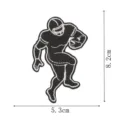 Vue détaillée du patch brodé de joueur de football américain en noir et blanc. - Style Athlète