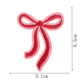Detailed shot of a red and pink bow embroidery patch, measuring 6.5x5.1cm for DIY crafts. - DW9806-3
