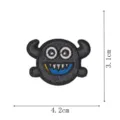 Close-up detail of a cute black monster embroidered patch with horns, size 4.2x3.1cm. - Black Funny Monster (DW9135-3)