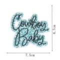 Vue détaillée du patch brodé Cowboy Baby avec imprimé léopard bleu et texte cursif. - Léopard Cowboy Baby
