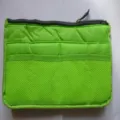 Green insert organizer bag detail, lightweight fabric with mesh pockets for neat storage. - M / Green
