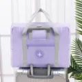 Lila faltbare Reisegepäcktasche mit Koffergriffgurt und wasserdichtem Stoff für Urlaub. - Einlagig / Lila